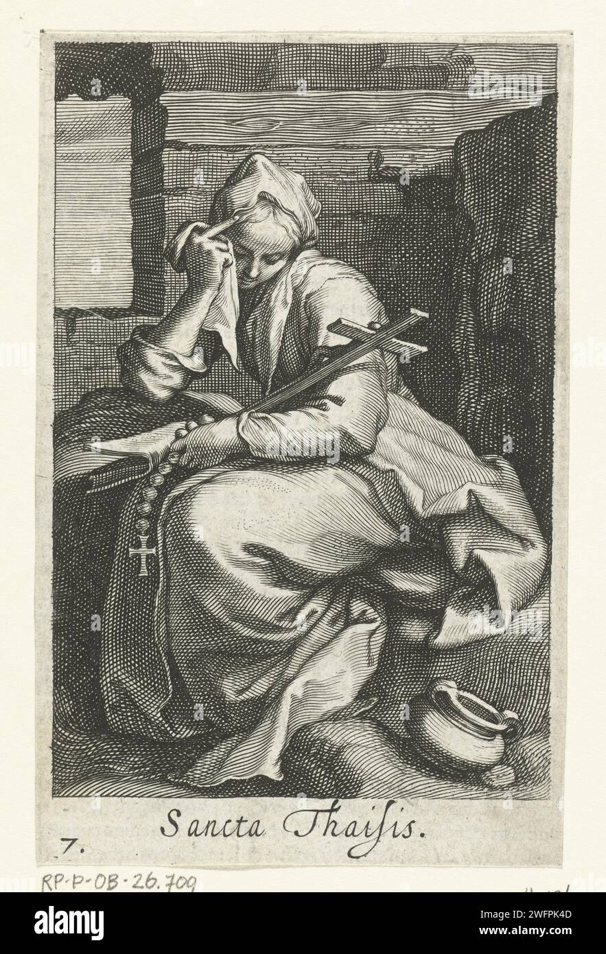 Holy Thaïs of Alexandria as a recluse, Boëtius Adamsz. Bolswert, after Abraham Bloemaert, 1619 print Sacred Thaïs of Alexandria as a recluse areas is in hermit cell with crucifix, Bible and rosary. On the Verso is a fragment French text from the edition. print maker: Amsterdampublisher: Low Countriespublisher: Antwerp paper engraving female saints. anchorite, hermit Stock Photo