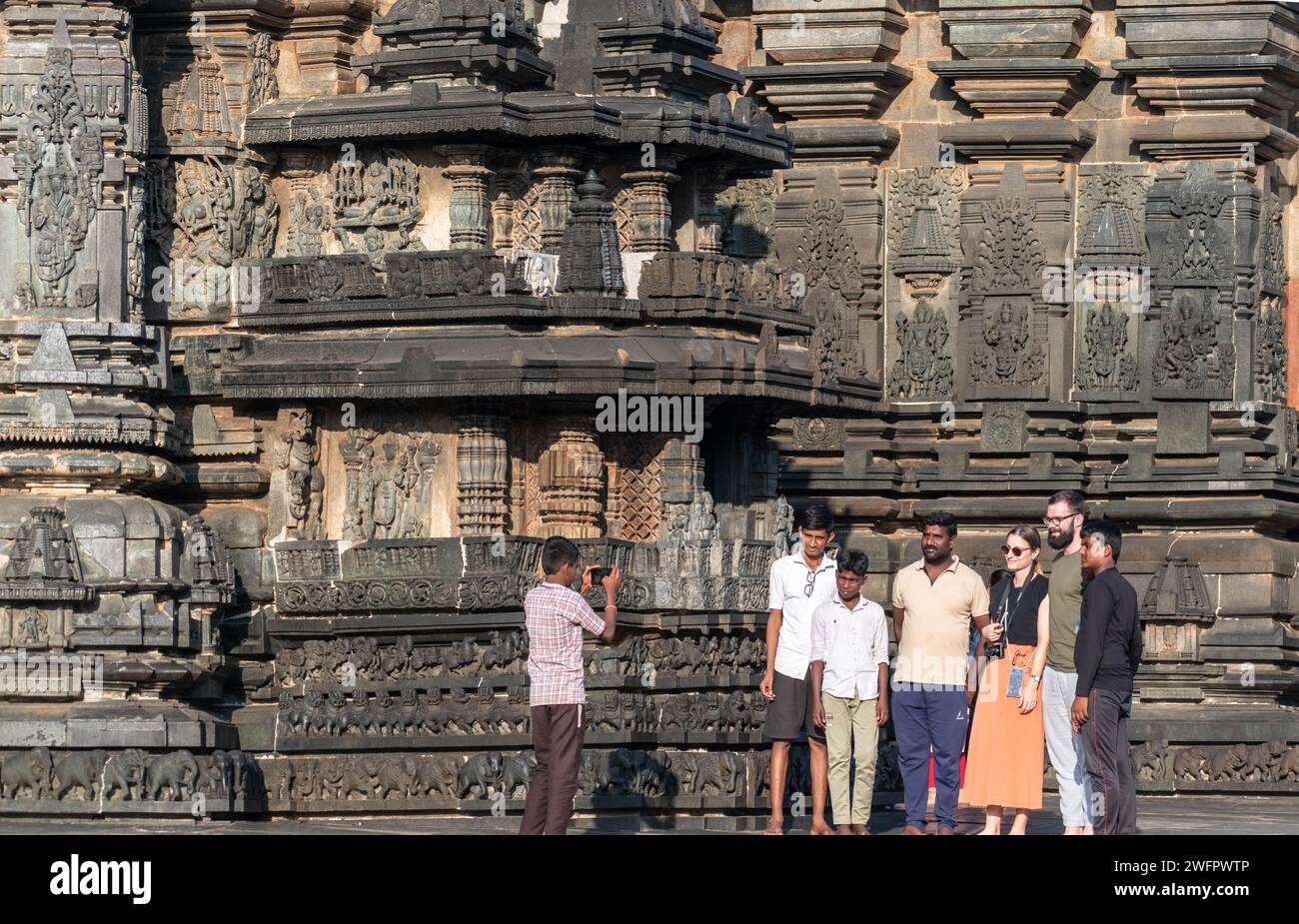 Belur, Karnataka, India - January 9 2023: A large crowd of Indian tourists at the historic Chennakeshava temple complex. Stock Photo