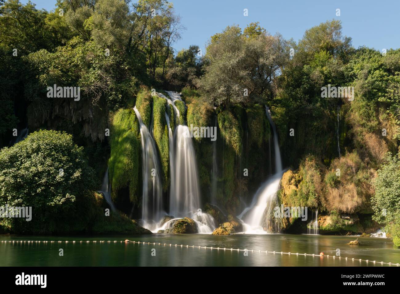 Kravice waterfalls on river Trebizat in summer during sunny day, long exposure with silky water Stock Photo
