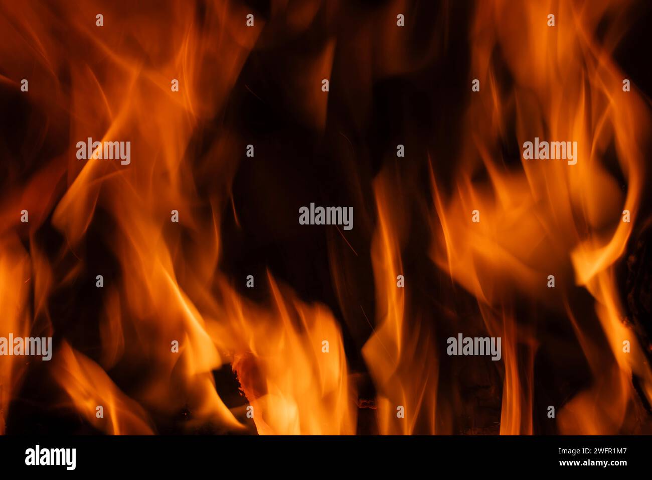 Raging orange flames of fire Stock Photo - Alamy