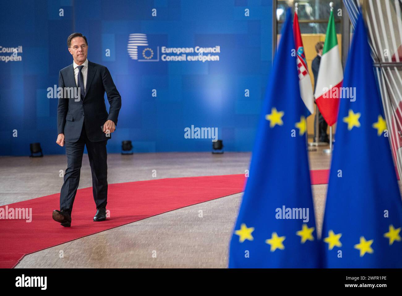 BRUSSELS - Outgoing Prime Minister Mark Rutte arrives for a new EU summit on the new budget. Discussions include billions in support for Ukraine, which the leaders did not agree on during the previous summit. ANP JONAS ROOSENS netherlands out - belgium out Stock Photo