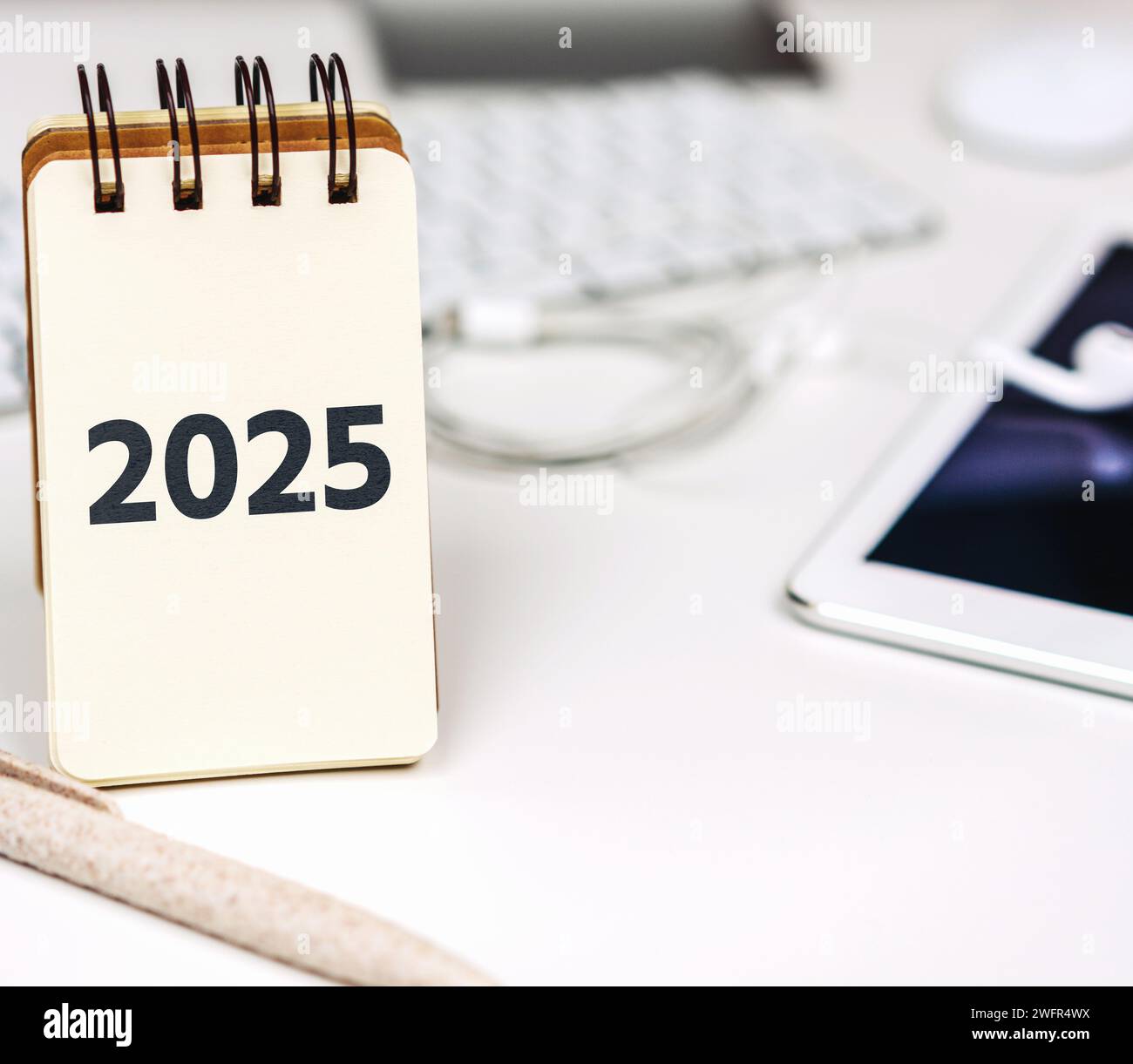 Business planning and forecasting in 2025. Notepad with 2025 on the