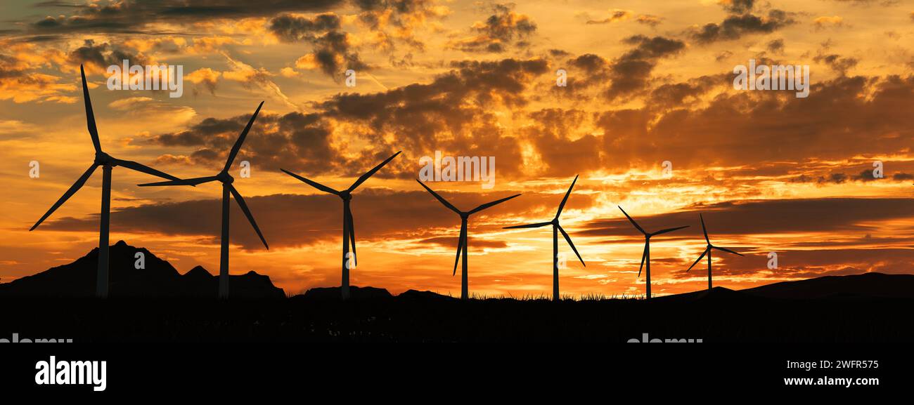 Wind turbines in a row in the evening. Silhouette of wind turbines. Sky ...