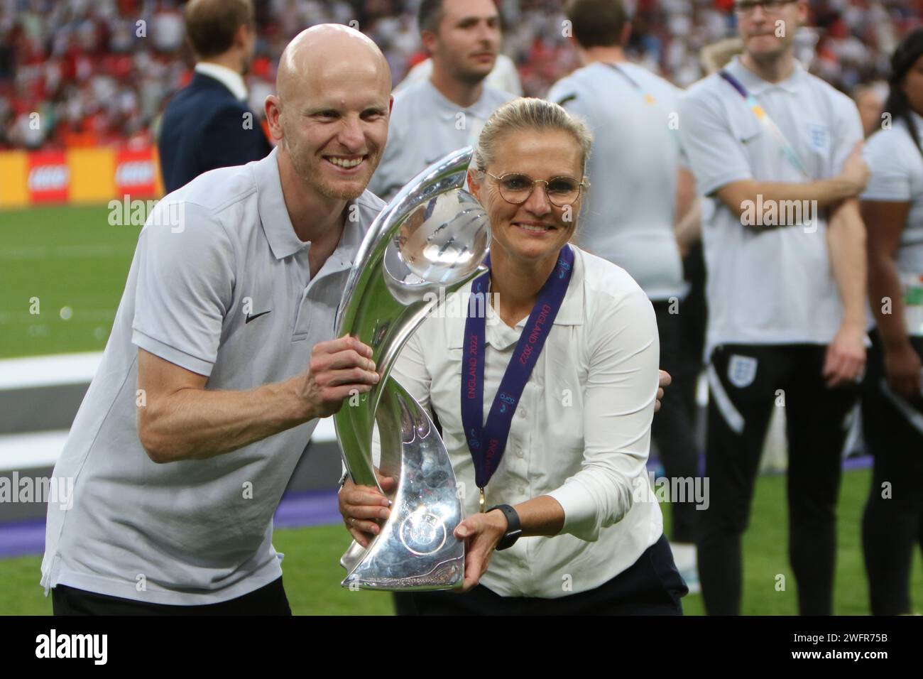 Head coach Sarina Wiegman and assistant Arjan Veurink hold trophy UEFA Women's Euro Final England v Germany Wembley Stadium, London 31 July 2022 Stock Photo