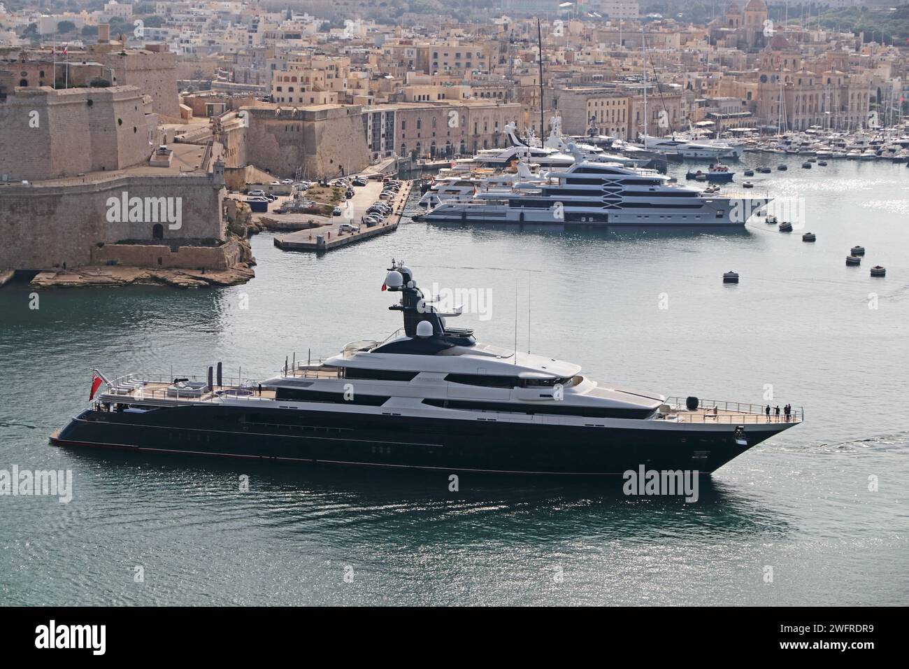 Superyacht 'Tranquility' entering harbour, Valletta Stock Photo