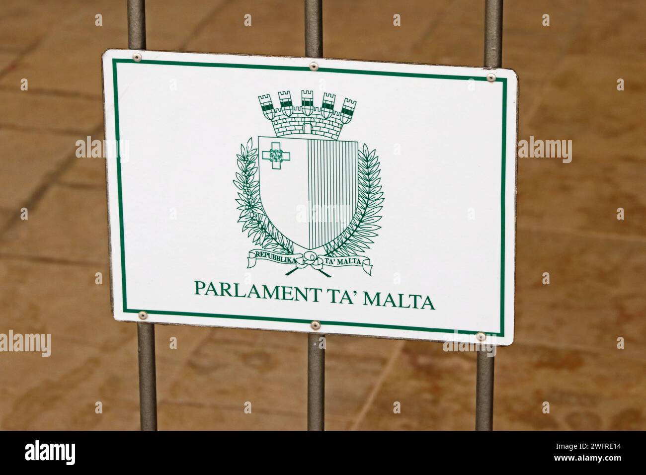 Plaque on railings surrounding Parliament of Malta building, Valletta ...
