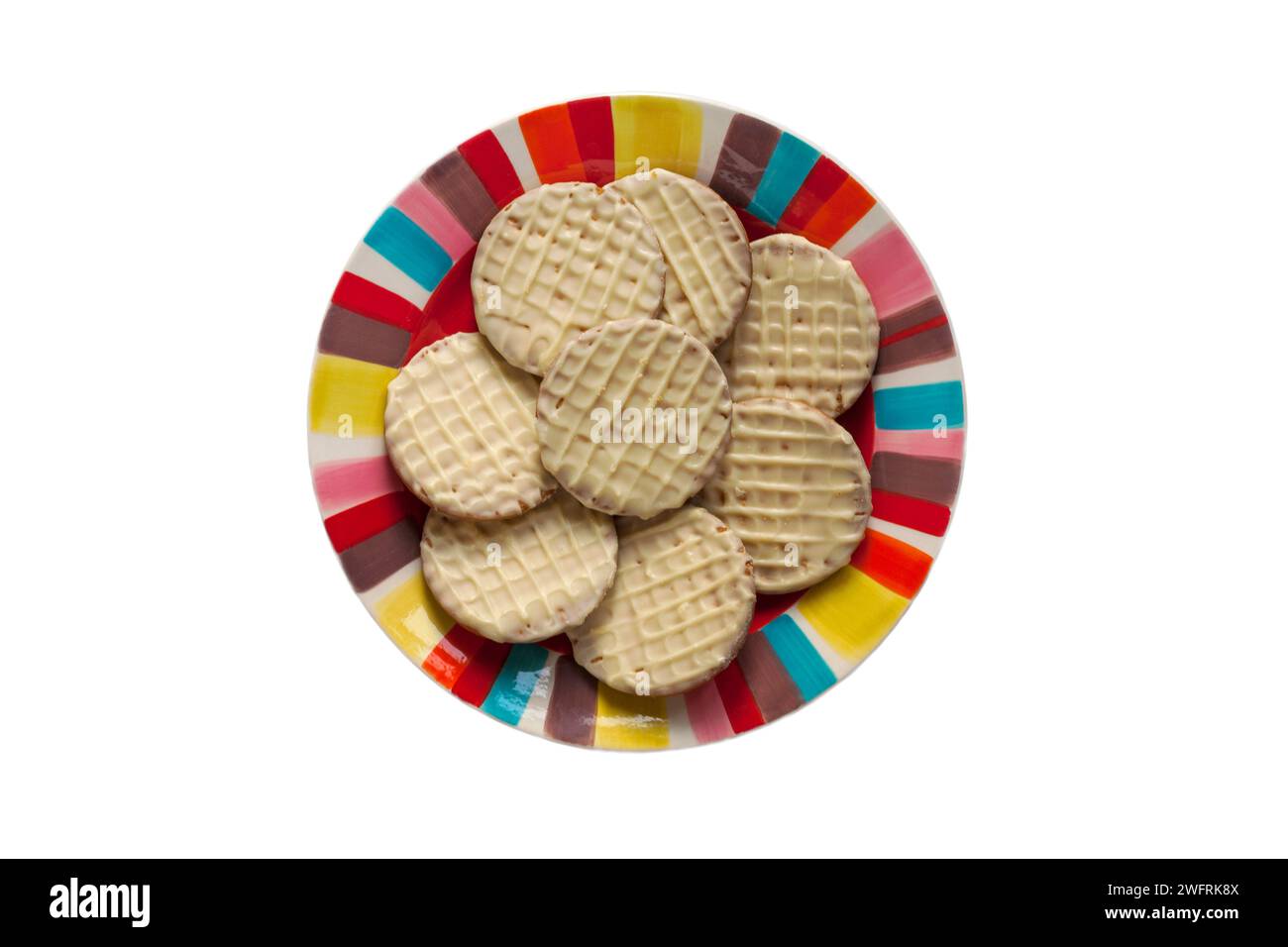 McVitie's Digestives White Chocolate biscuits on plate isolated on white background - smooth & creamy - UK Stock Photo