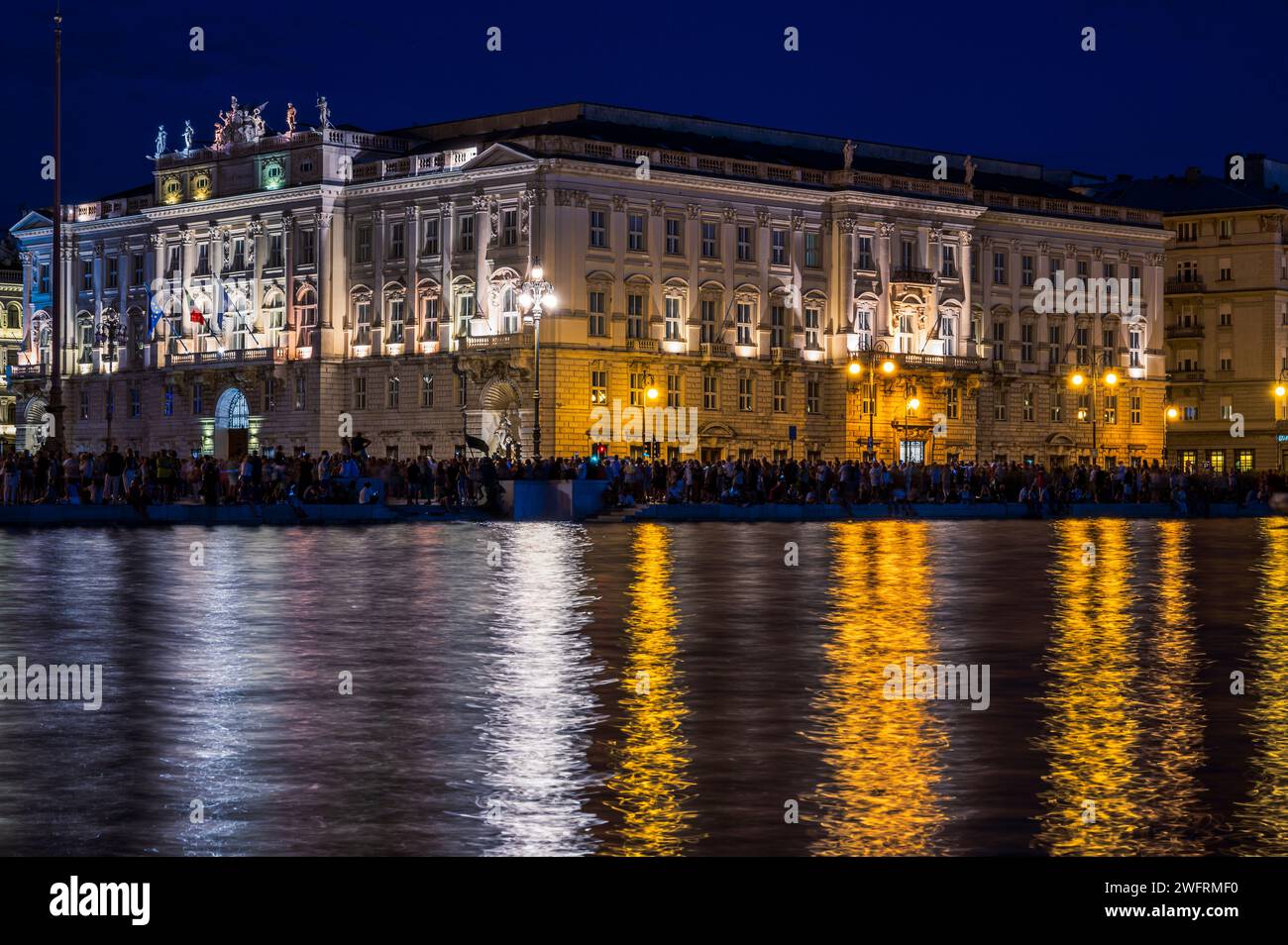 Trieste Night Dusk and night in Trieste. Between historic buildings and the sea Stock ...