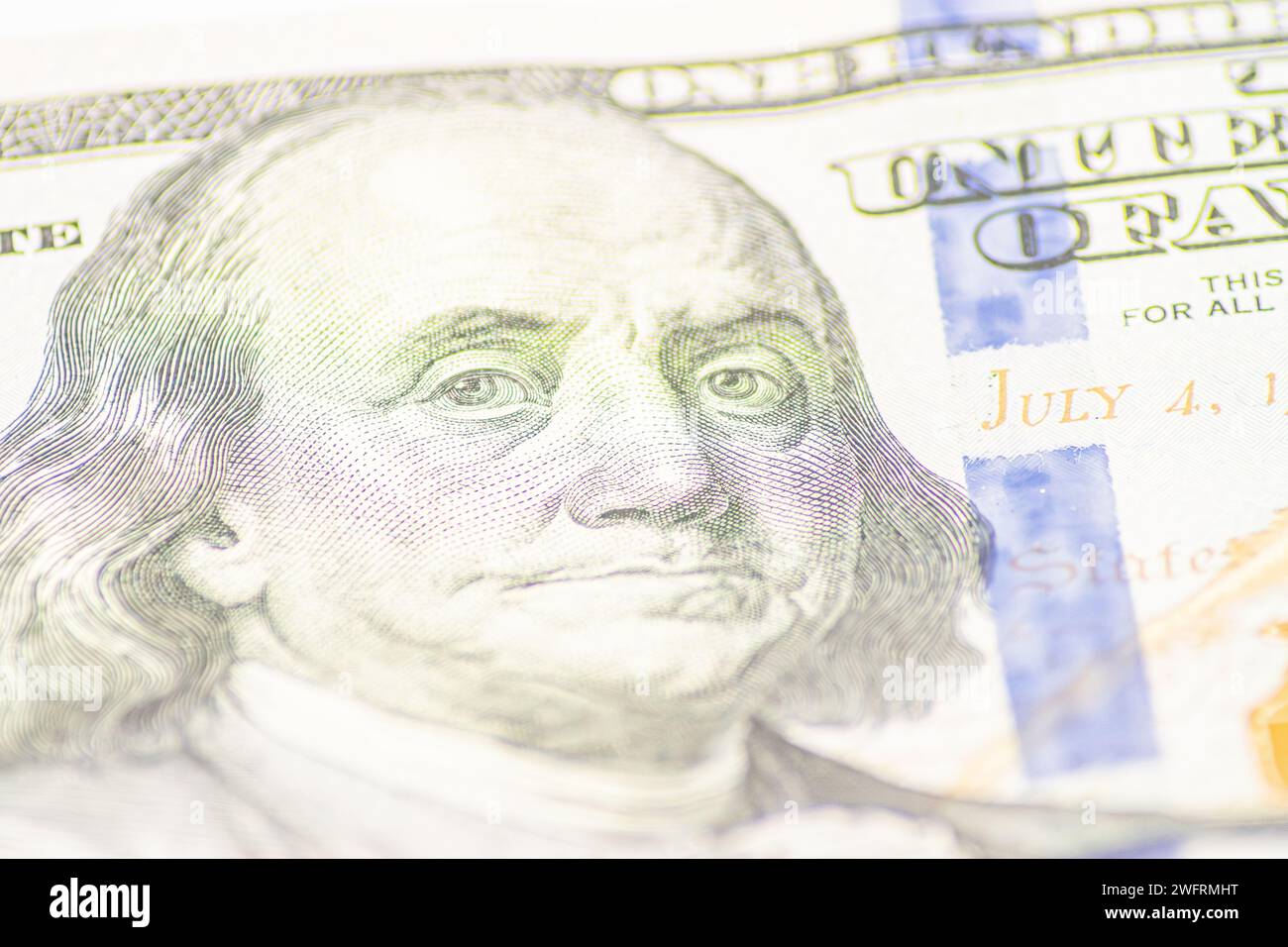 Dollars closeup. Benjamin Franklin's portrait on one hundred dollar ...