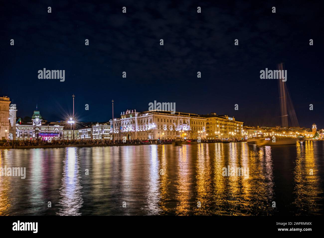 Trieste Night Dusk and night in Trieste. Between historic buildings and the sea Stock ...
