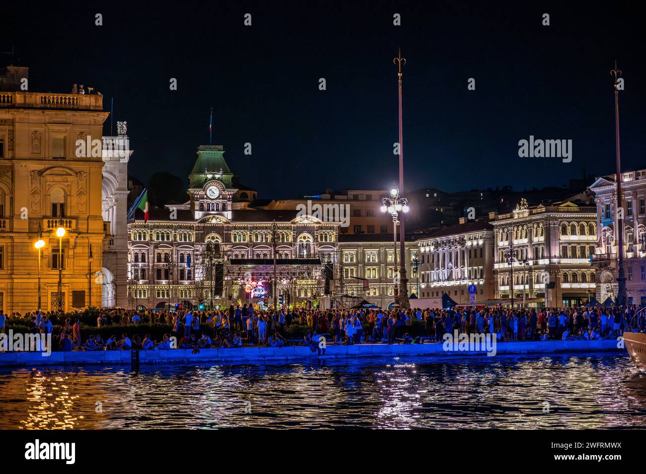 Trieste Night Dusk and night in Trieste. Between historic buildings and the sea Stock ...
