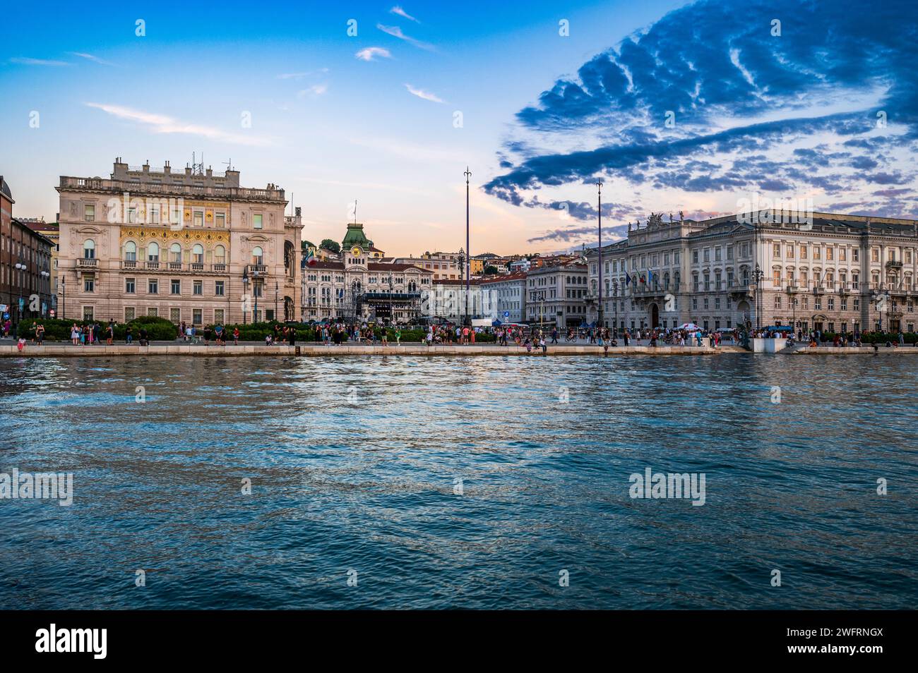 Trieste Night Dusk and night in Trieste. Between historic buildings and the sea Stock ...