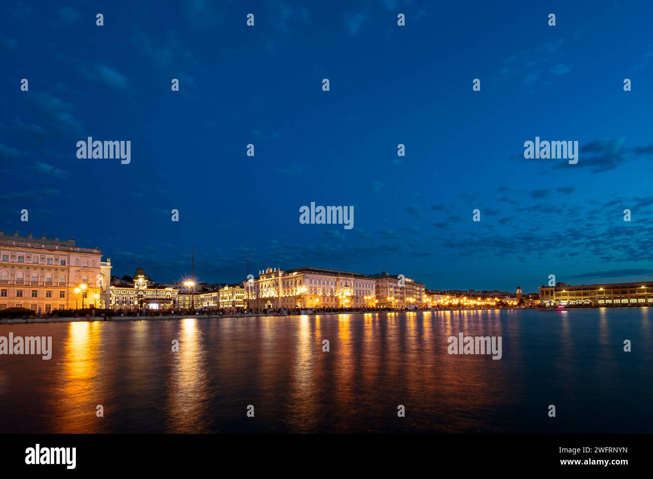 Trieste Night Dusk and night in Trieste. Between historic buildings and the sea Stock ...