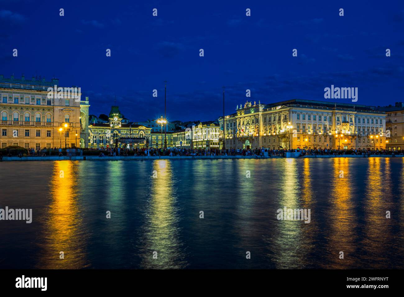 Trieste Night Dusk and night in Trieste. Between historic buildings and the sea Stock ...
