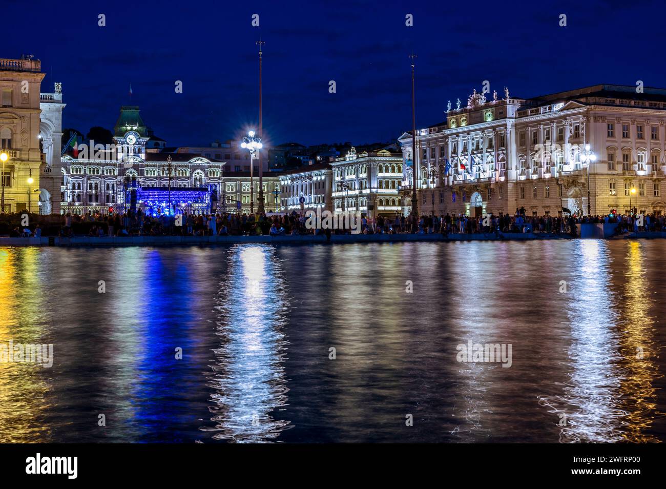 Trieste Night Dusk and night in Trieste. Between historic buildings and the sea Stock ...