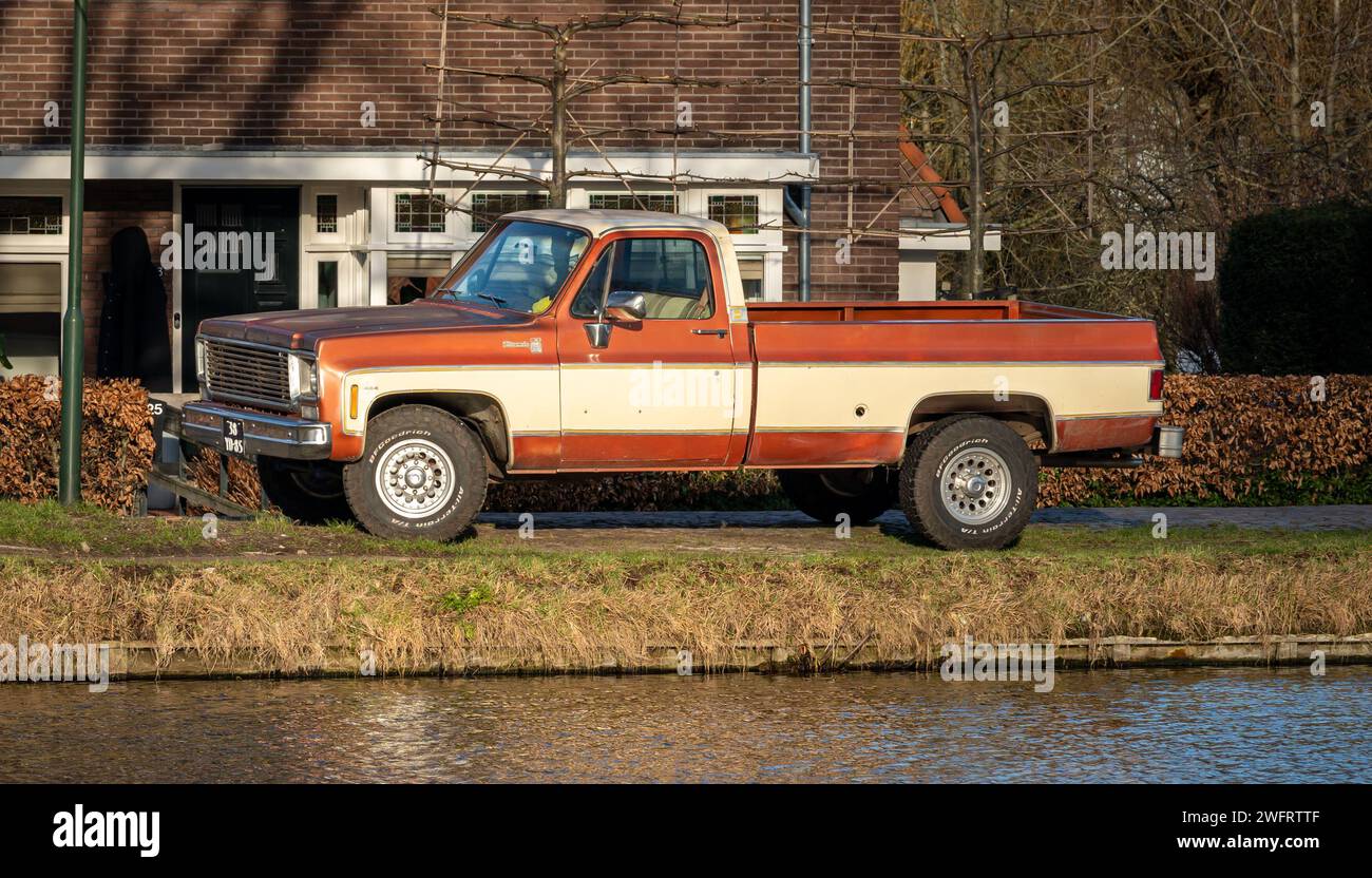 Schoonhoven, The Netherlands, 28.01.2024, Side view of classic pickup truck Chevrolet C 30 Silverado from 1976 Stock Photo
