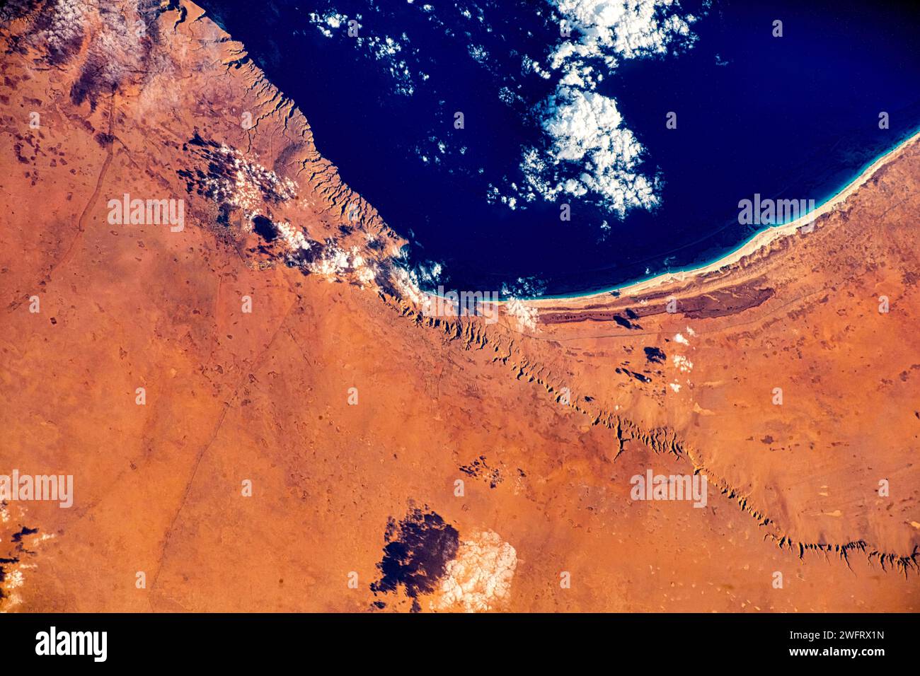 Desert coastline in the border of Egypt and Lybia. Digital enhancement of a NASA image. Stock Photo