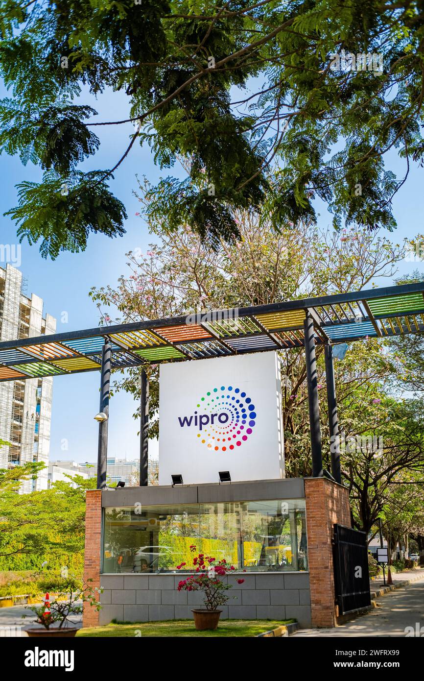 Wipro logo is shown at the entrance of their Sarjapur campus. Wipro ltd. is a leading technology services and consulting company. Stock Photo