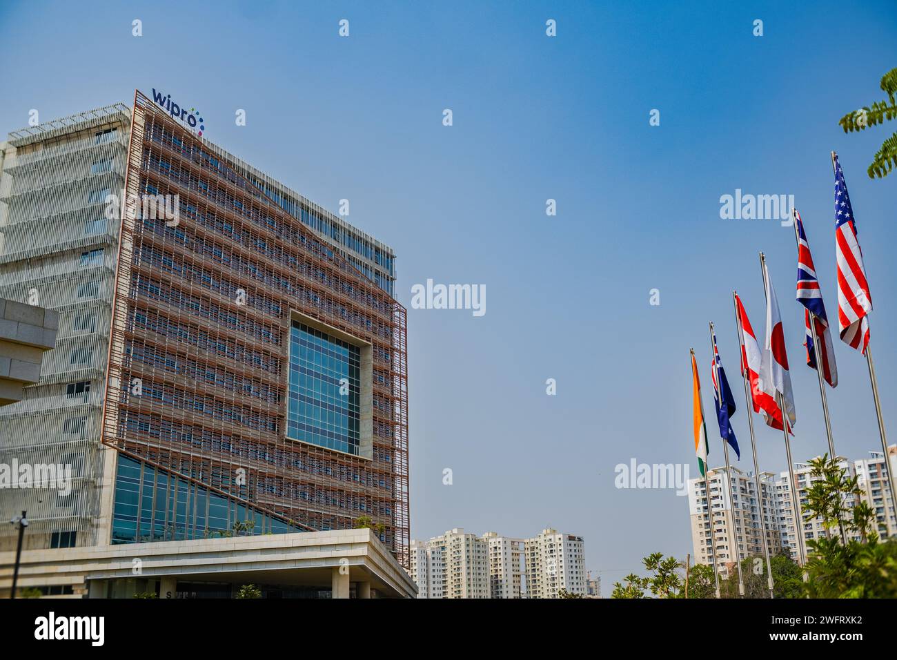 Wipro logo is shown at the top of their building. Wipro Ltd. is a