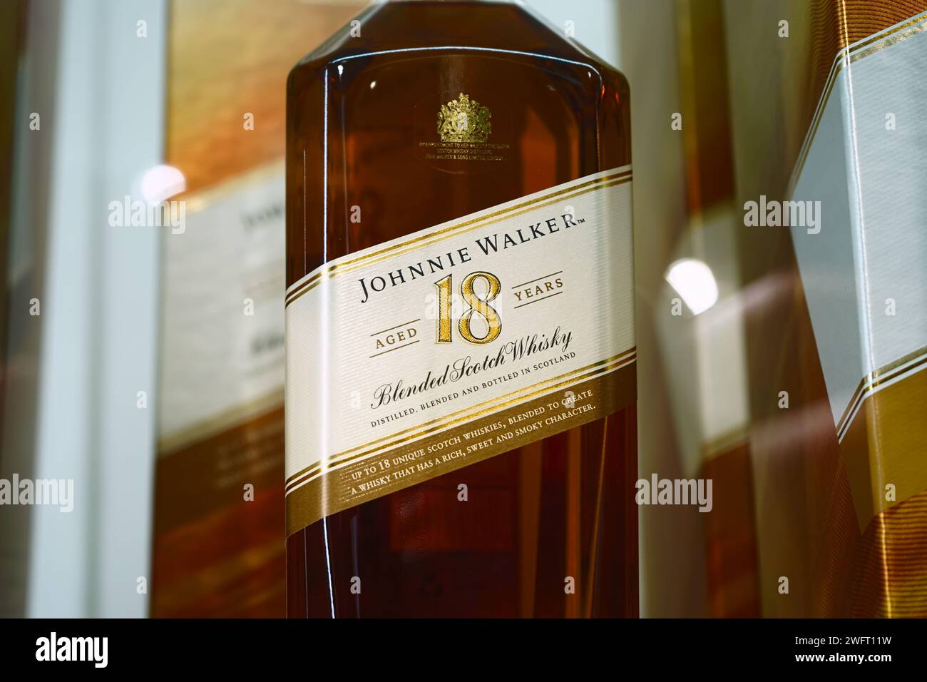 Honolulu, HI - January 12, 2024: Johnnie Walker Aged 18 Years blended scotch whisky bottle label closeup with selective focus. Stock Photo