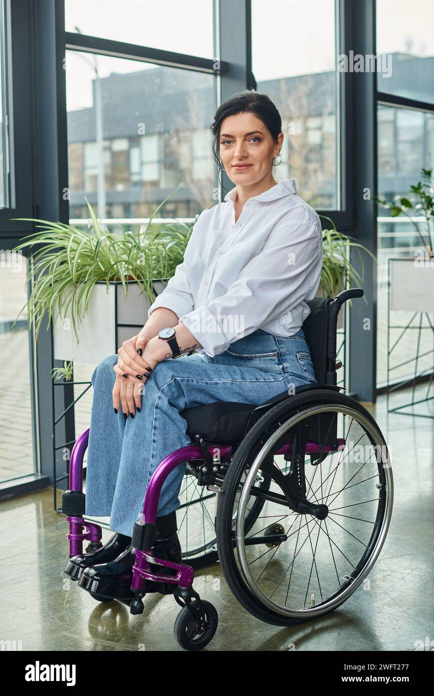 jolly attractive disabled businesswoman in wheelchair smiling happily ...