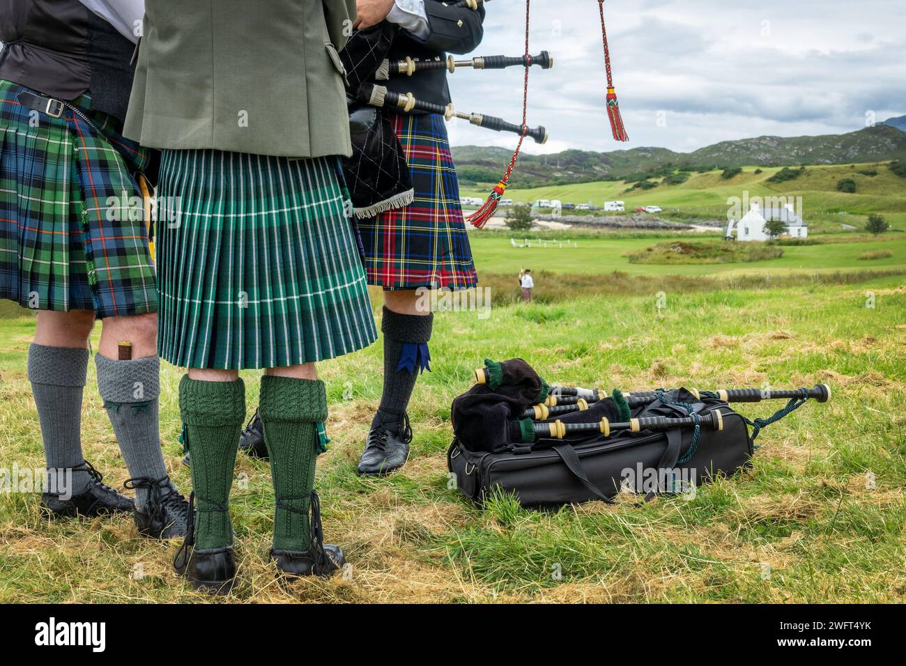 Scottish bagpipers dressed in traditional kilt during Highland Games, Scotland Stock Photo