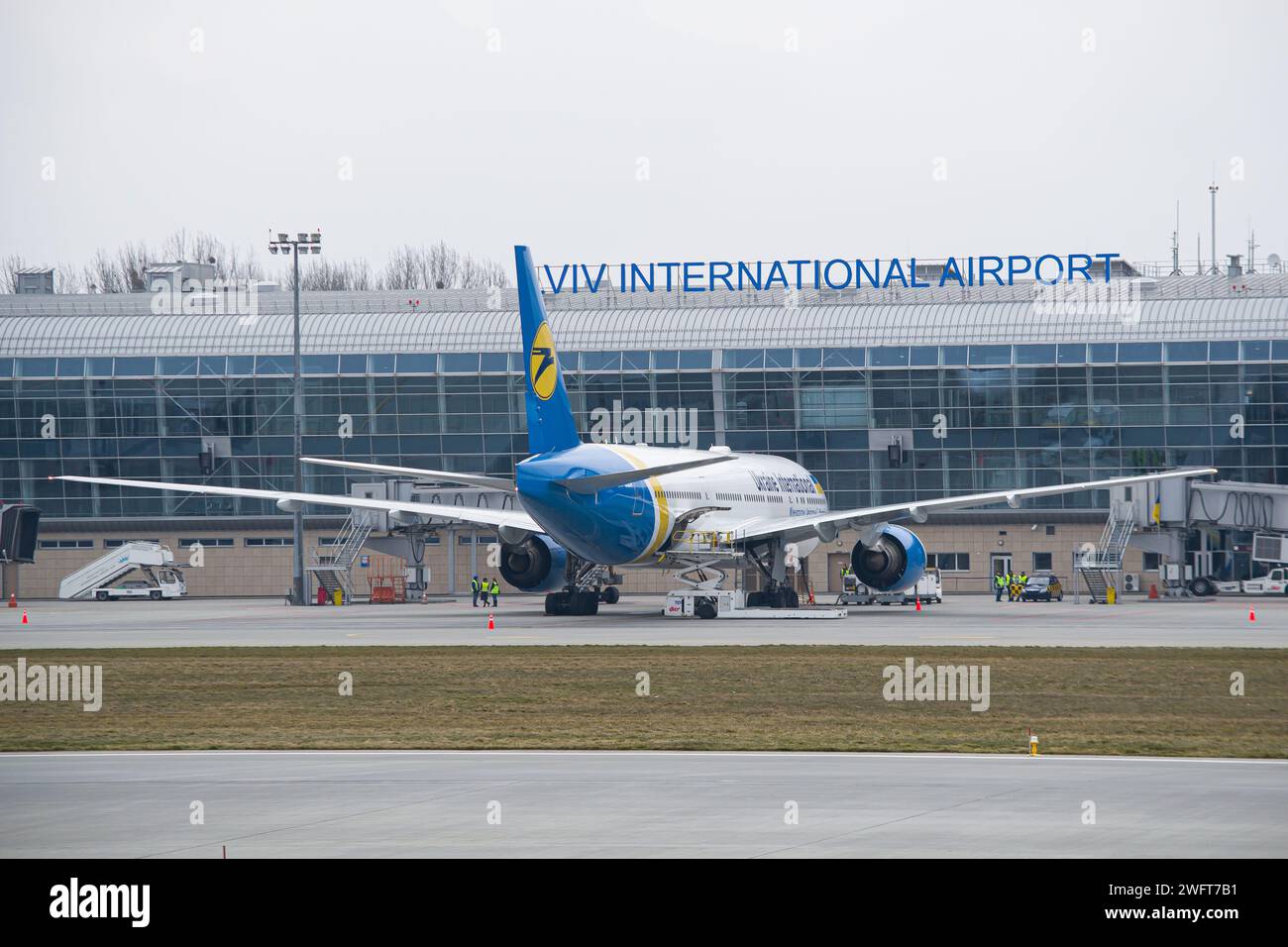 Ukraine International Airlines Boeing 777-200 boarding at Lviv Airport for a flight to Kyiv Stock Photo