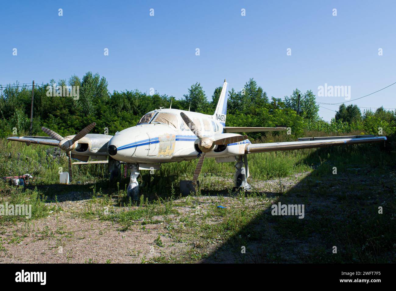 White small abandoned unbranded private passenger turboprop aircraft parked Stock Photo