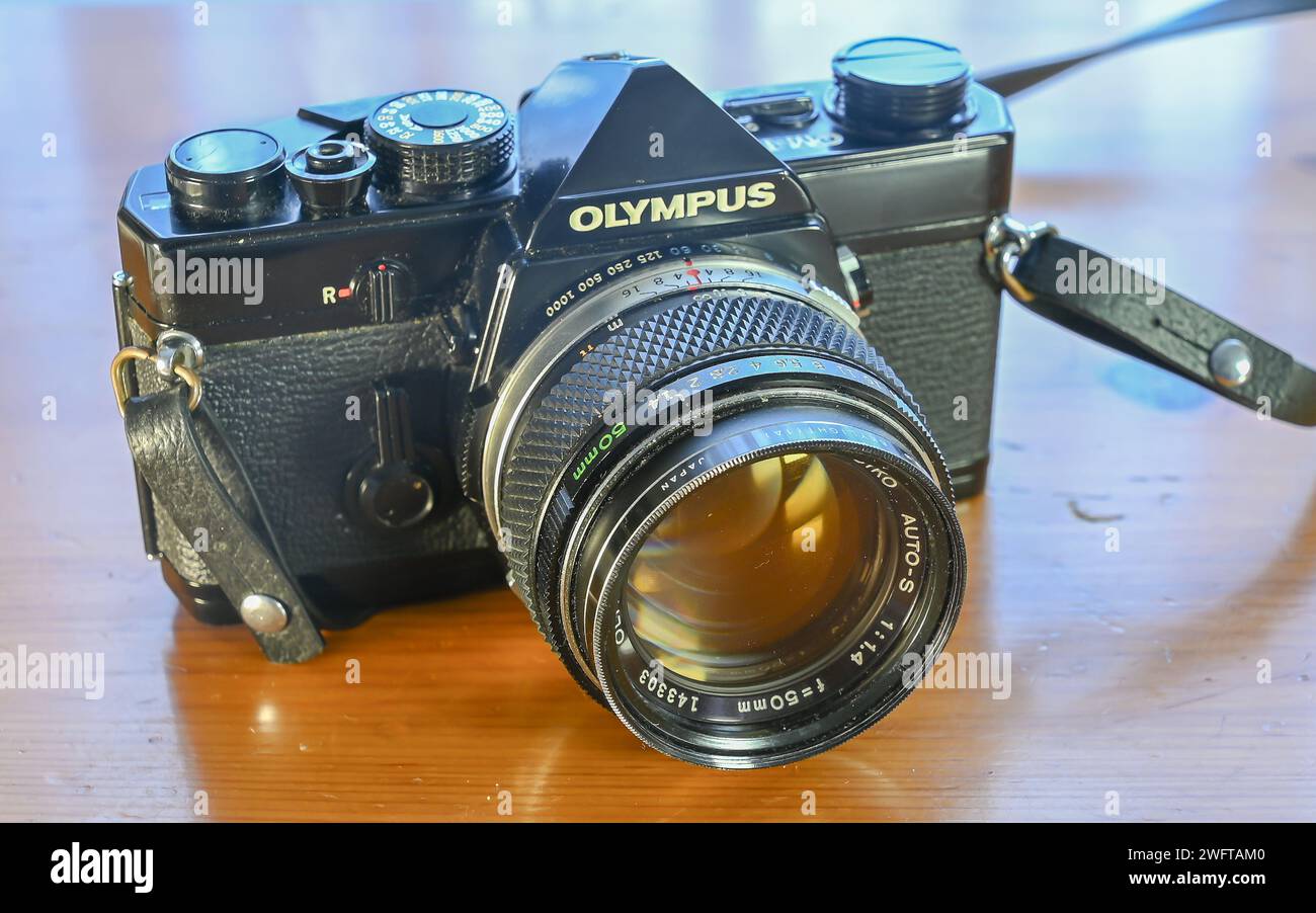 A Retro vintage Olympus OM1 35mm single lens reflex film camera and