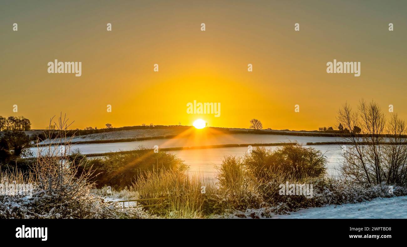 Sunrise Over A Farmers Fields Stock Photo
