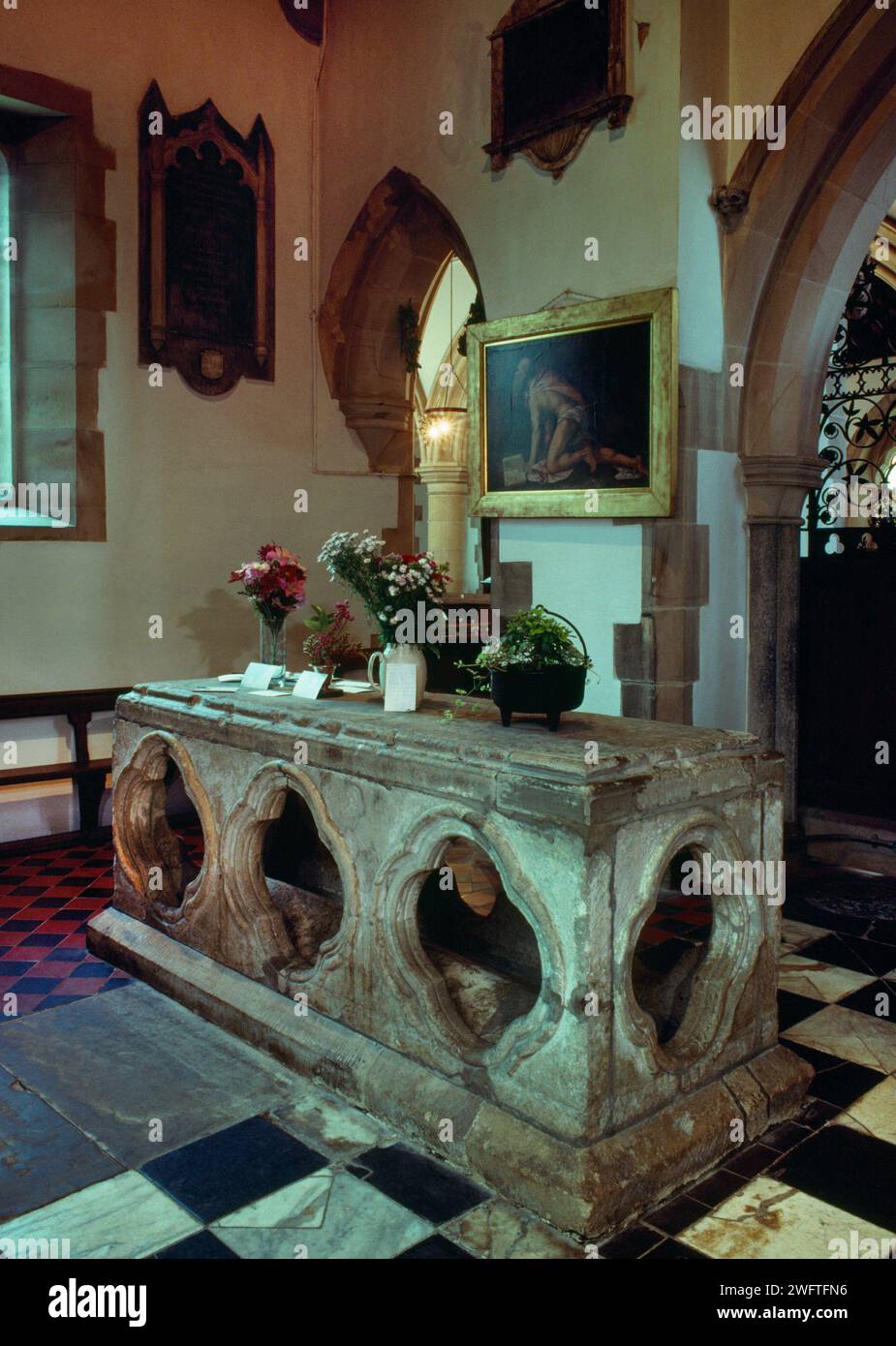 The C9th tomb cover of St Bertram set within a C14th shrine inside Holy