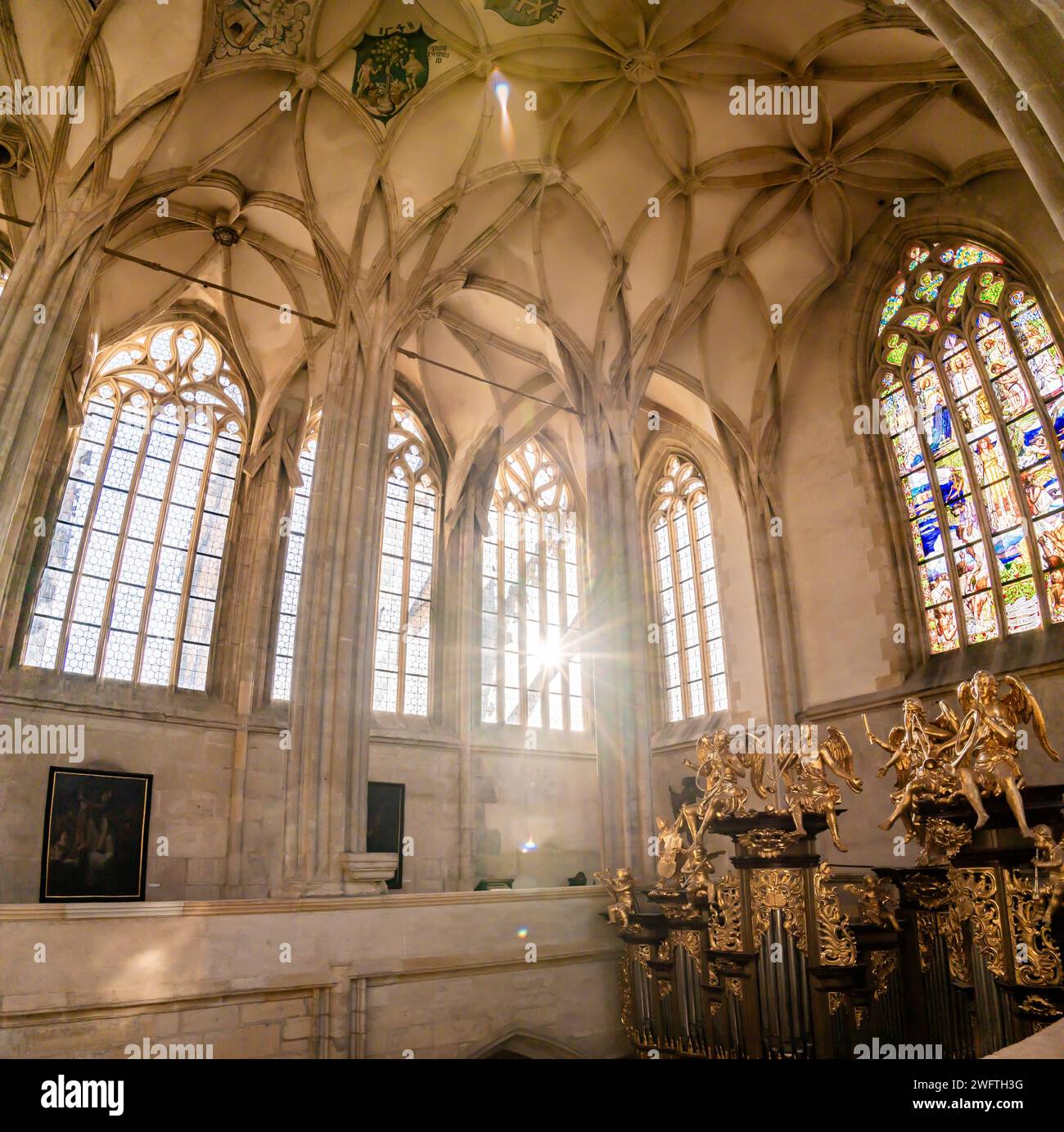 Kutna Hora, Czech Republic - 19.11.2023: Interior of St. Barbara cathedral in Kuttenberg. Famous christianity church. Interiors during soft magic ligh Stock Photo