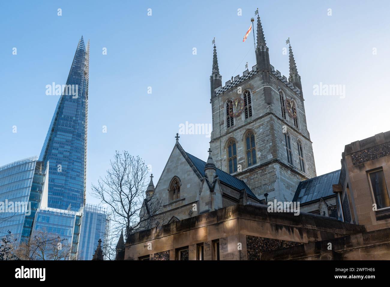 View of The Shard and Southwark Cathedral, modern and old architecture buildings, London, England, UK Stock Photo