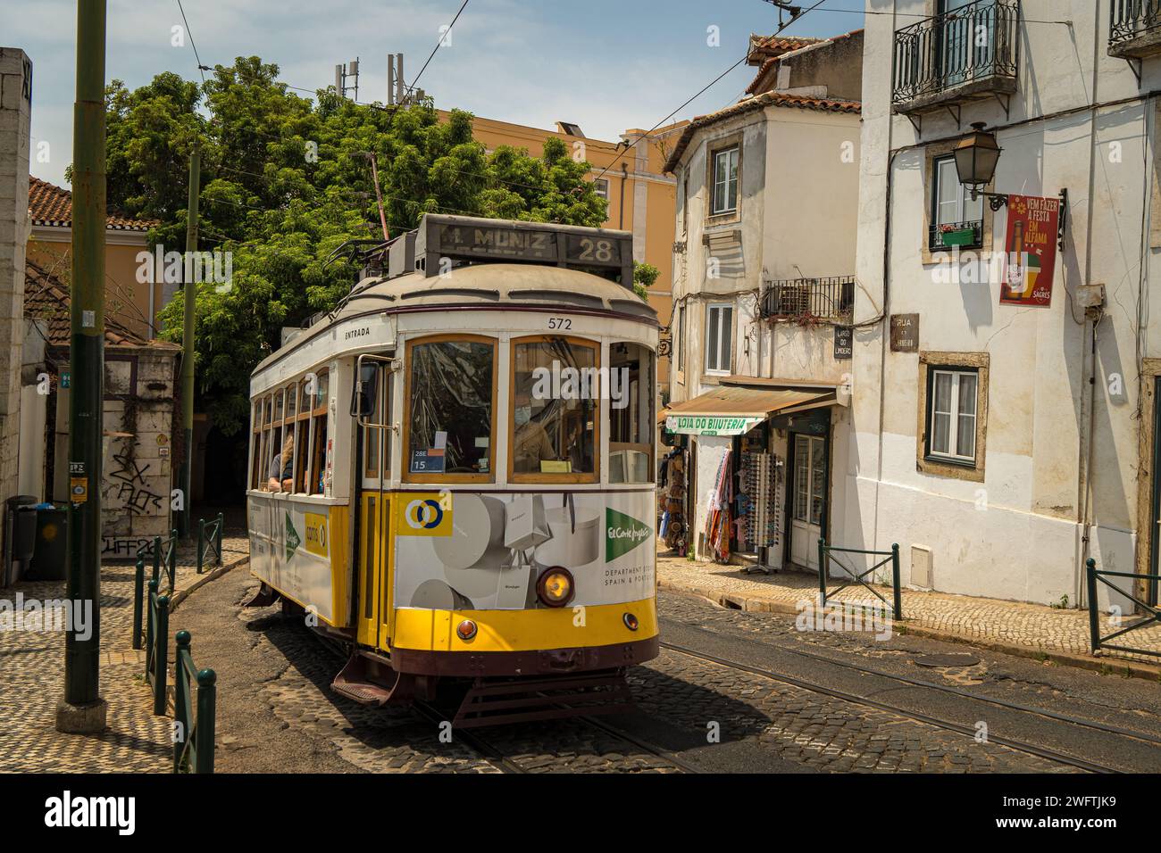 Lisbon, Portugal- July 4,2022; Famous yellow vintage tram on the street in Lisbon, Portugal. Famous travel destination Stock Photo