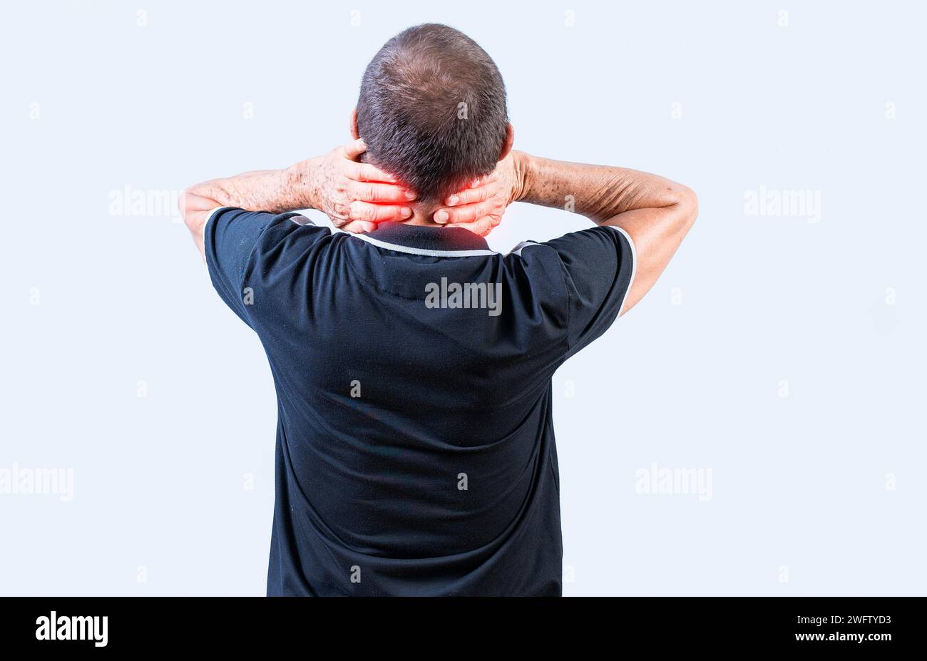Rear view of Mature man with neck tension isolated. People suffering with neck pain isolated. Neck pain and stress concept Stock Photo