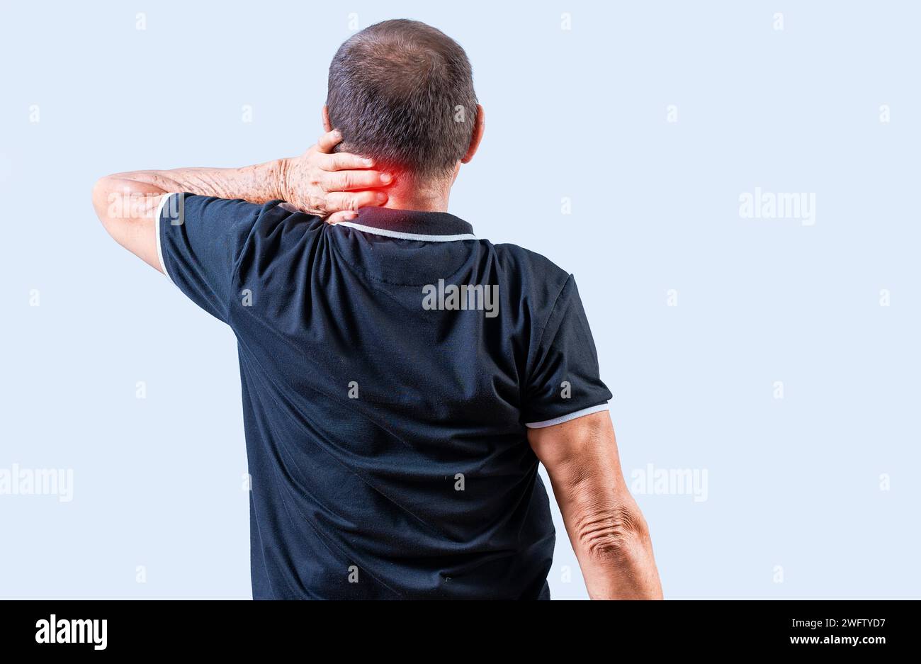 People suffering with neck pain isolated. Rear view of Mature man with neck tension isolated. Neck pain and stress concept Stock Photo
