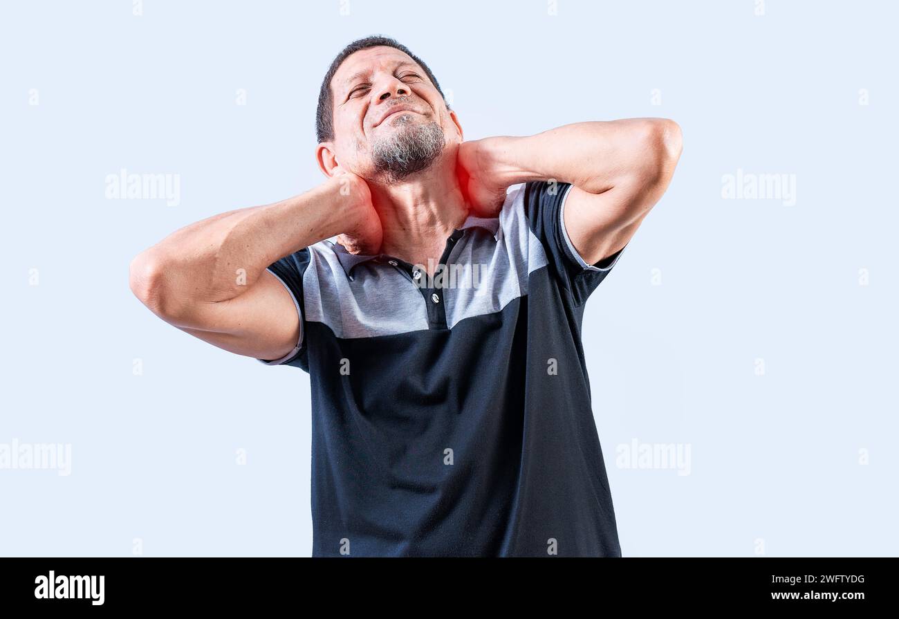 Mature man with neck tension isolated. Neck pain and stress concept. Elderly person suffering with neck pain isolated Stock Photo