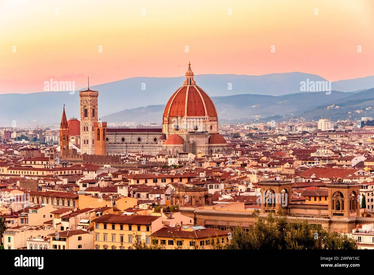 The Duomo in Florence at sunset ,with the striking Dome built by Filippo Brunelleschi ,Florence, Italy Stock Photo