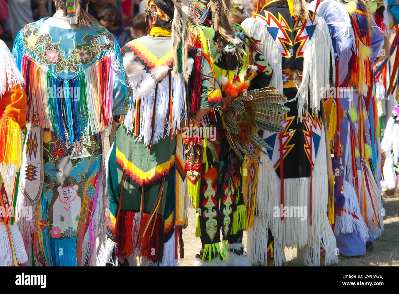 Powwow colorful outfits in a celebration of American Indigenous Culture Stock Photo