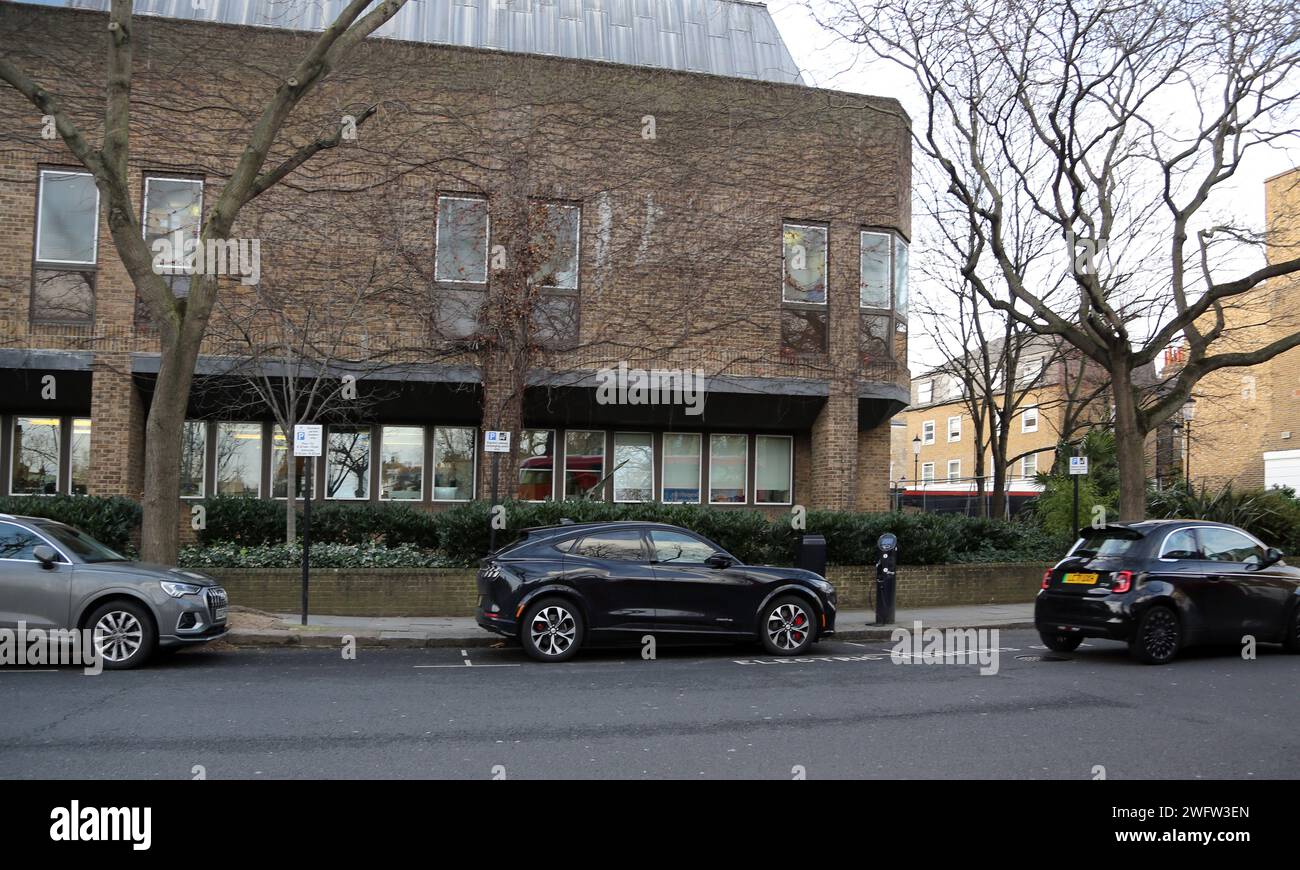 Electric Vehicle Recharging point with Contactless Payment Sydney Street Chelsea London England Stock Photo