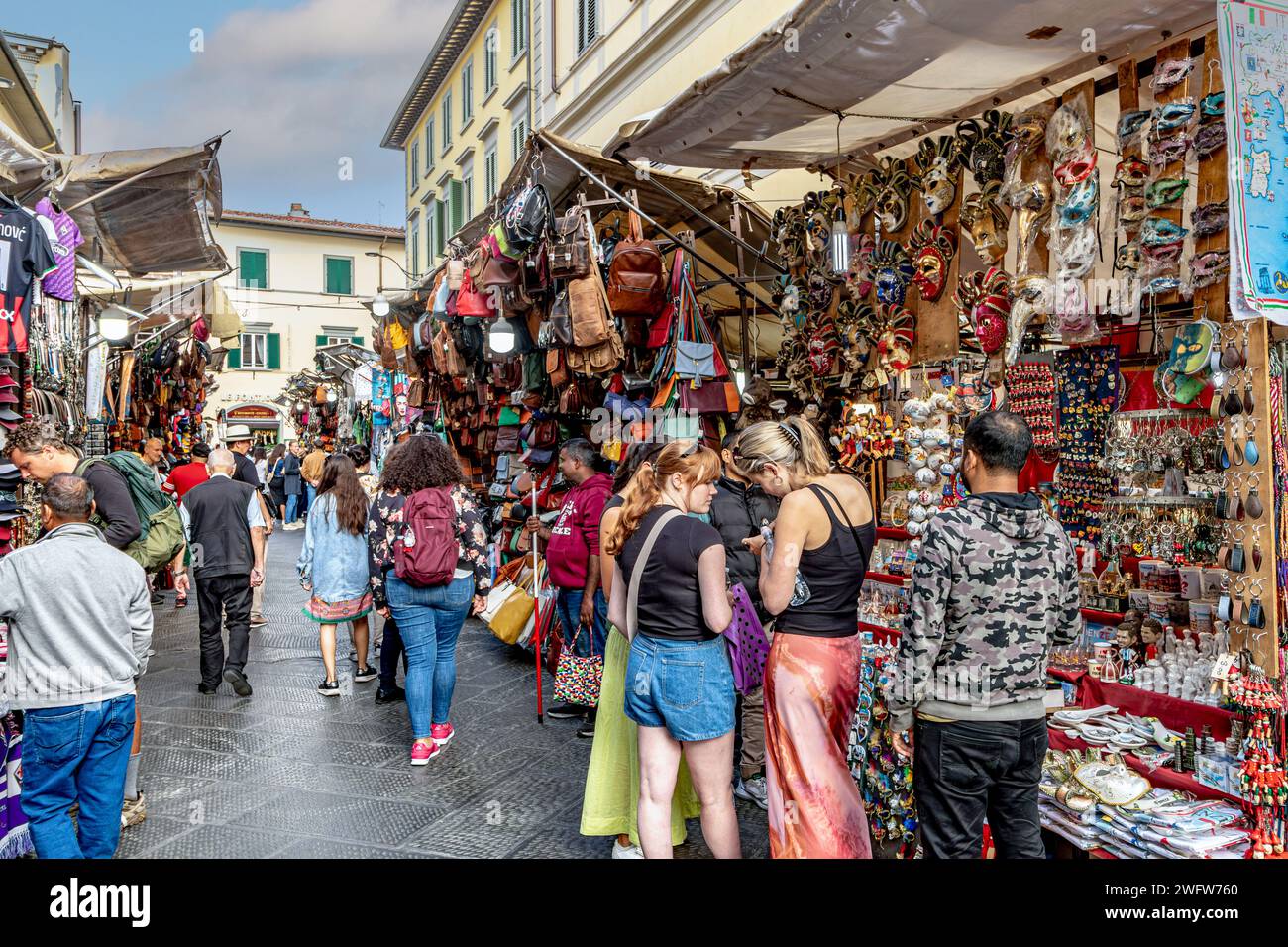 Tourists shopping at a stall in Florence,Italy Stock Photo