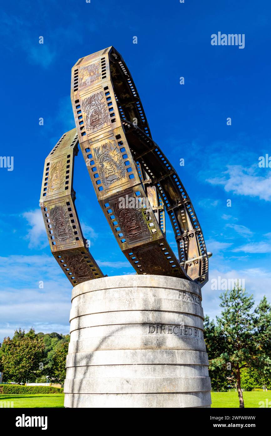 Film reel sculpture with image of Frankenstein commemorating director James Whale, Dudley, England Stock Photo