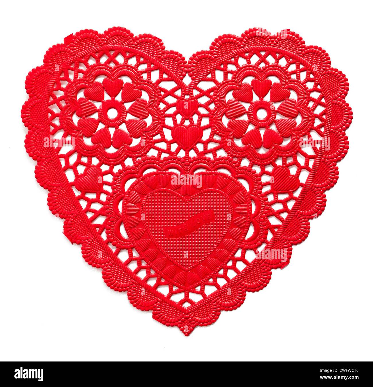 Red Paper Heart Doily Cut Out on White. Stock Photo