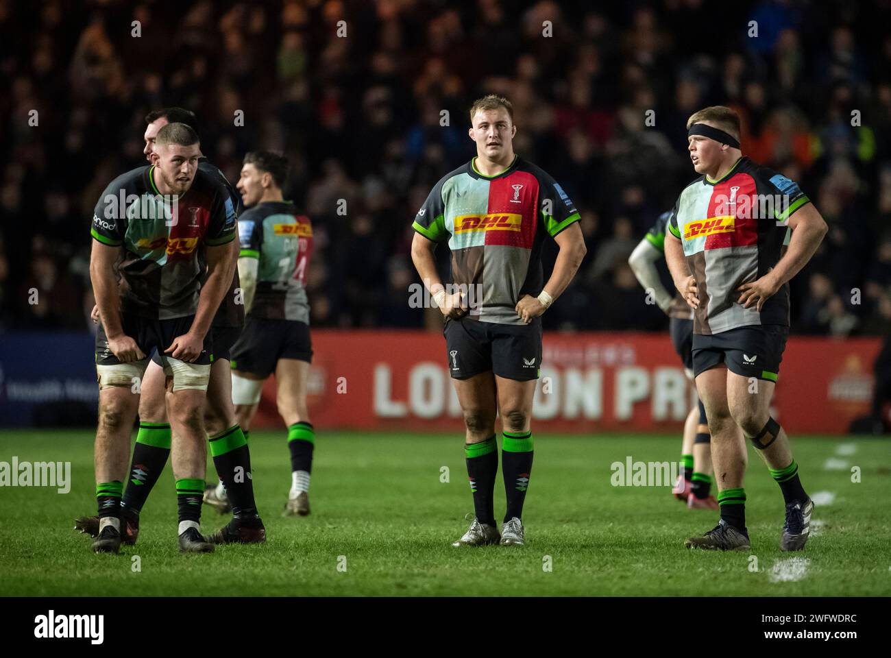 Harlequins Hammond, Alex Dombrandt and Fin Baxter in action