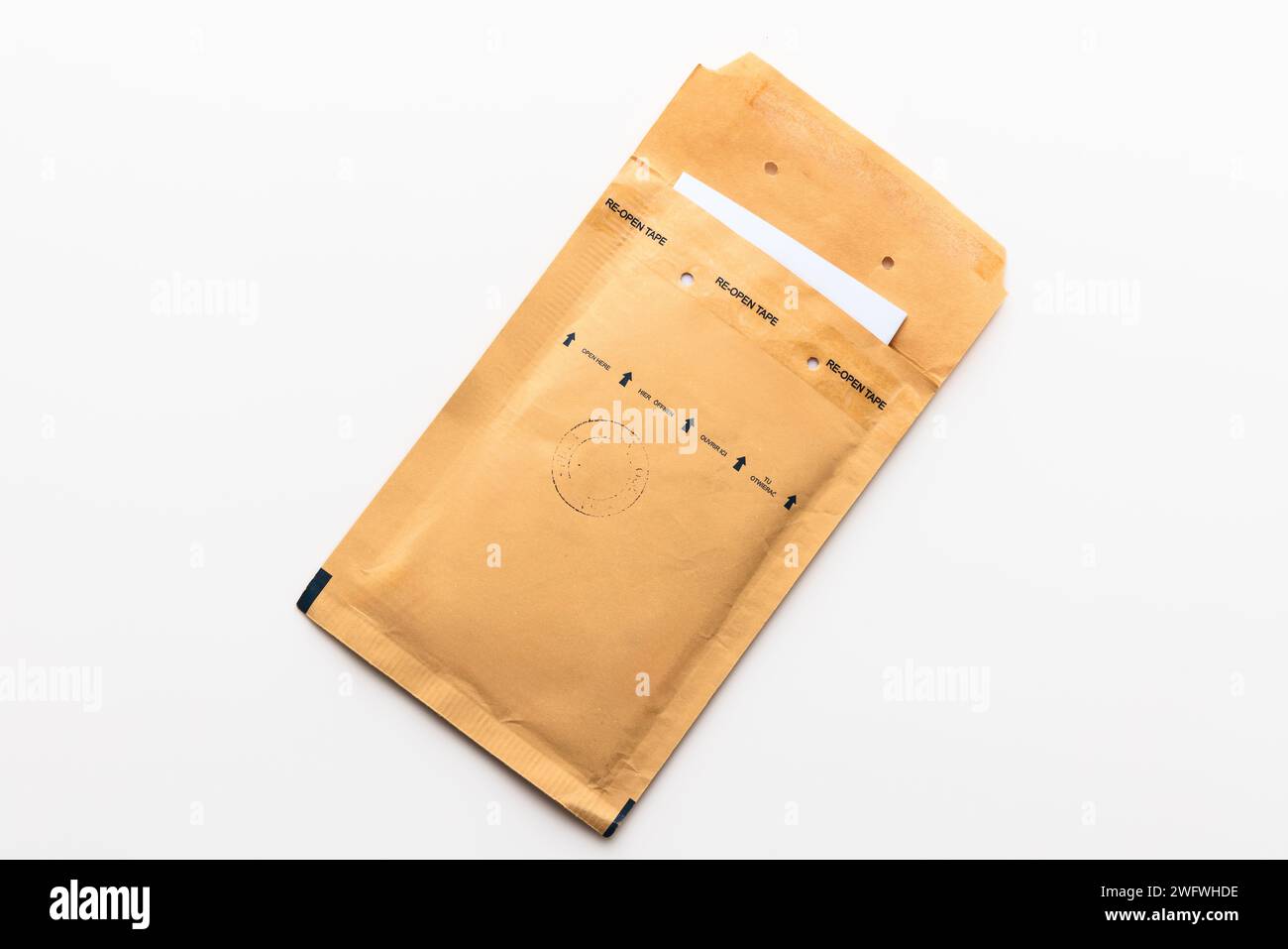 Padded envelope top view isolated on white background, cardboard bag