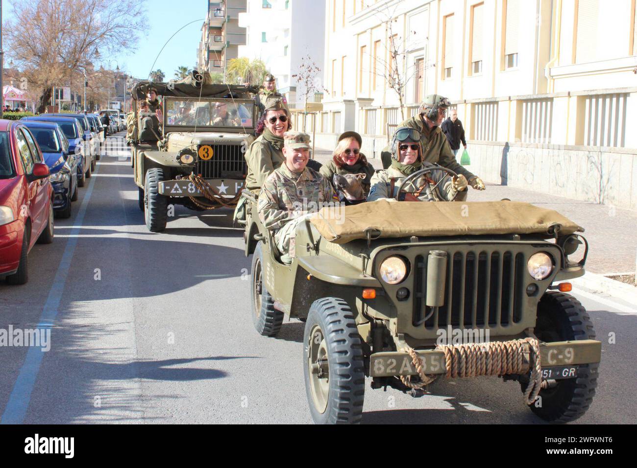 The 2nd Armored Brigade Combat Team, 1st Armored Division, command team Col. Dwight D. Domengeaux and Command Sgt. Maj. Jesus H. Peńa, participate in a military procession through the city of Nettuno honoring the legacy of the soldiers who fought on the beachhead of Anzio-Nettuno, Italy on Jan. 21, 2024. The 2nd Armored Brigade Combat Team, 1st Armored Division then known as Combat Command Bravo, participated in the Allied landing on X-Ray Beach in Nettuno on Jan. 22, 1944. Stock Photo