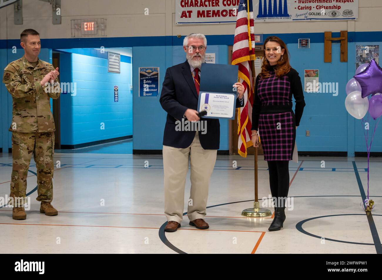 The Purple Star Award is presented Dr. Stephen Young, Memorial middle