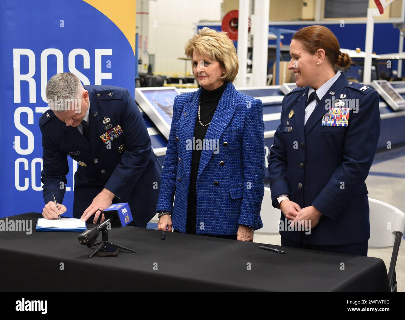 TINKER AIR FORCE BASE, Okla. — Brig. Gen. Brian Moore, left, commander of the Oklahoma City Air Logistics Complex, signs an education partnership agreement among Rose State College, the OC-ALC and the 72nd Air Base Wing during a ceremony held on Tinker Air Force Base, Oklahoma, Jan. 17. The partnership provides Rose State with access to industry resources and experts while providing a pipeline for Rose’s STEM students to explore a career at the OC-ALC, which is the largest single-site employer in the state of Oklahoma. Stock Photo