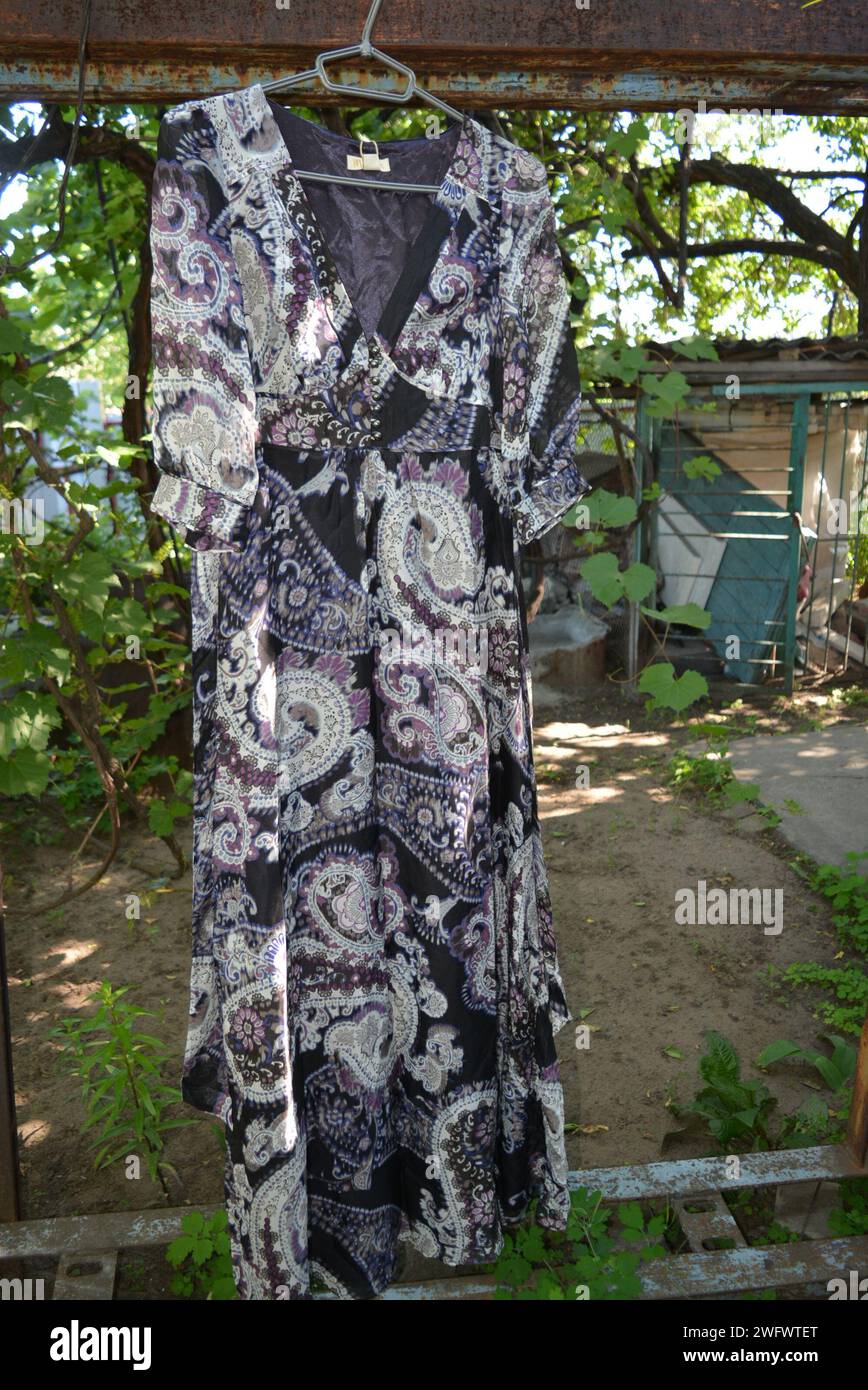 Black silk cloak hi-res stock photography and images - Alamy