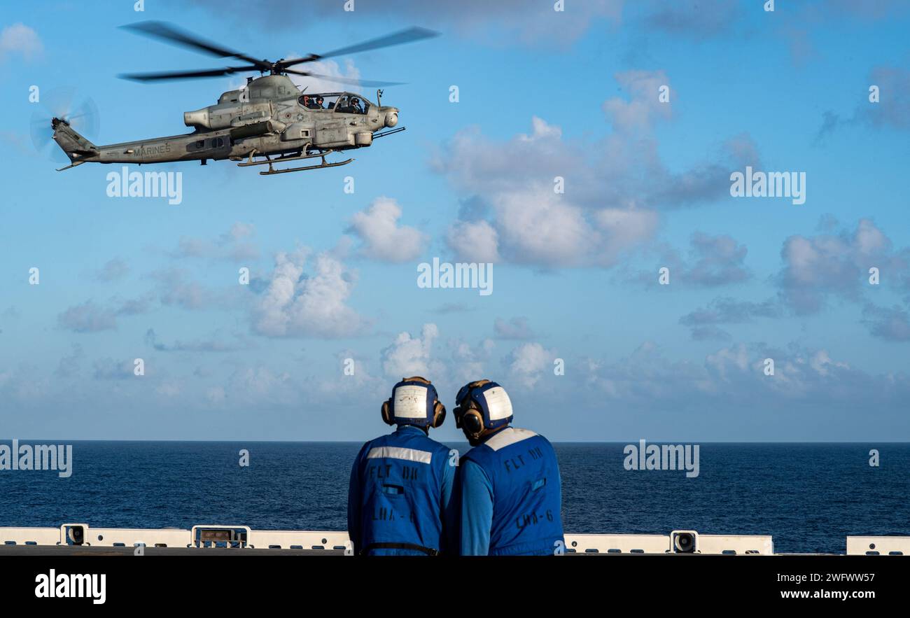 PHILIPPINE SEA January 20 2024 Sailors Assigned To The Forward   Philippine Sea January 20 2024 Sailors Assigned To The Forward Deployed Amphibious Assault Carrier Uss America Lha 6 Observe As An Ah 1z Viper Attack Helicopter From Marine Fighter Attack Squadron Vmfa 121 Lands On The Ships Flight Deck While Sailing In The Philippine Sea January 20 America Lead Ship Of The America Amphibious Ready Group Is Operating In The Us 7th Fleet Area Of Operations Us 7th Fleet Is The Us Navys Largest Forward Deployed Numbered Fleet And Routinely Interacts And Operates With Allies And Partners In Preserving A Free And Open Indo Pacific Region 2WFWW57 